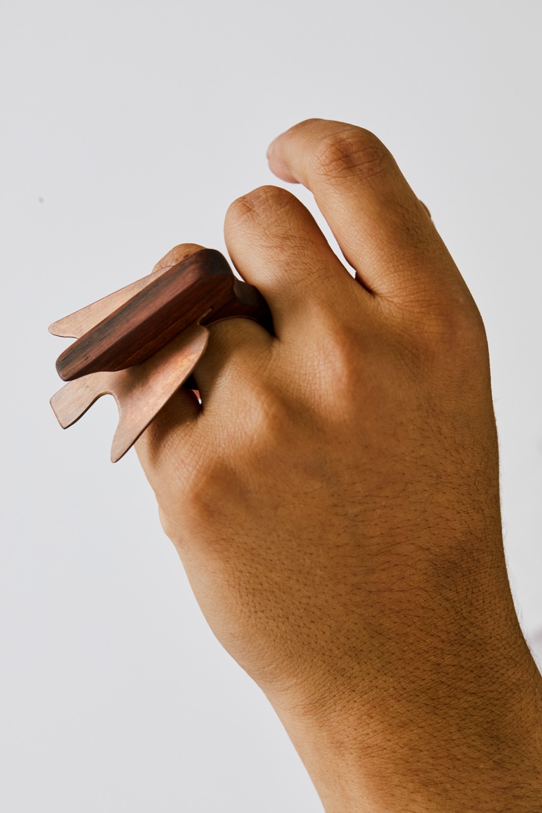 Carved wood and copper wing ring