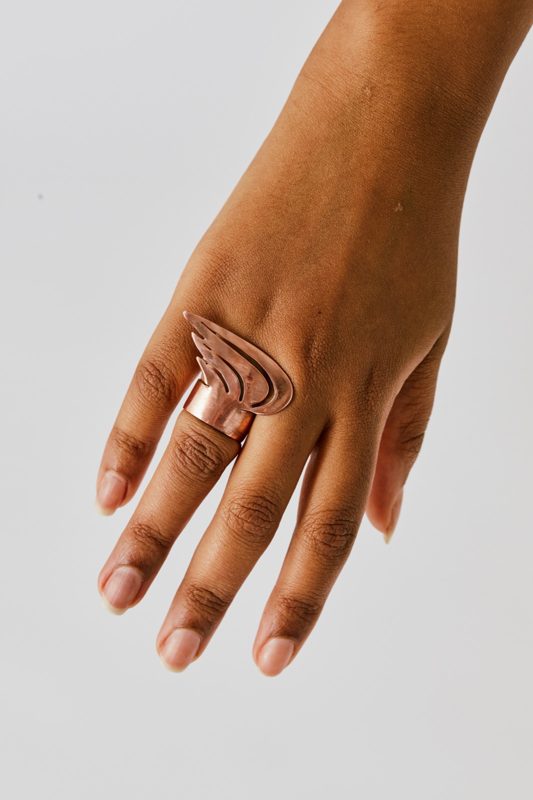 Layered copper wing ring